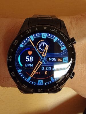 Hybrid smartwatch on wrist with classic analog style and smart features